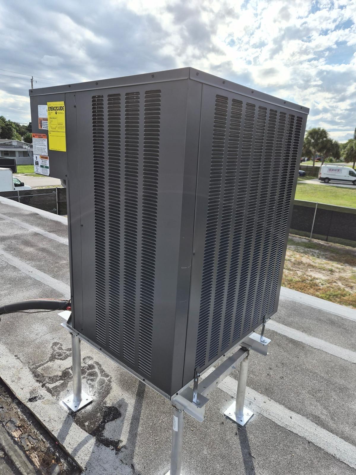 Rooftop condenser installation by AAA AC Quality AR Corp in Florida